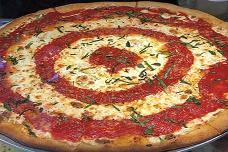 Fresh pizza at Bravo Pizza in Staten Island
