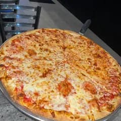 Square pepperoni Sicilian slice with a thick browned edge