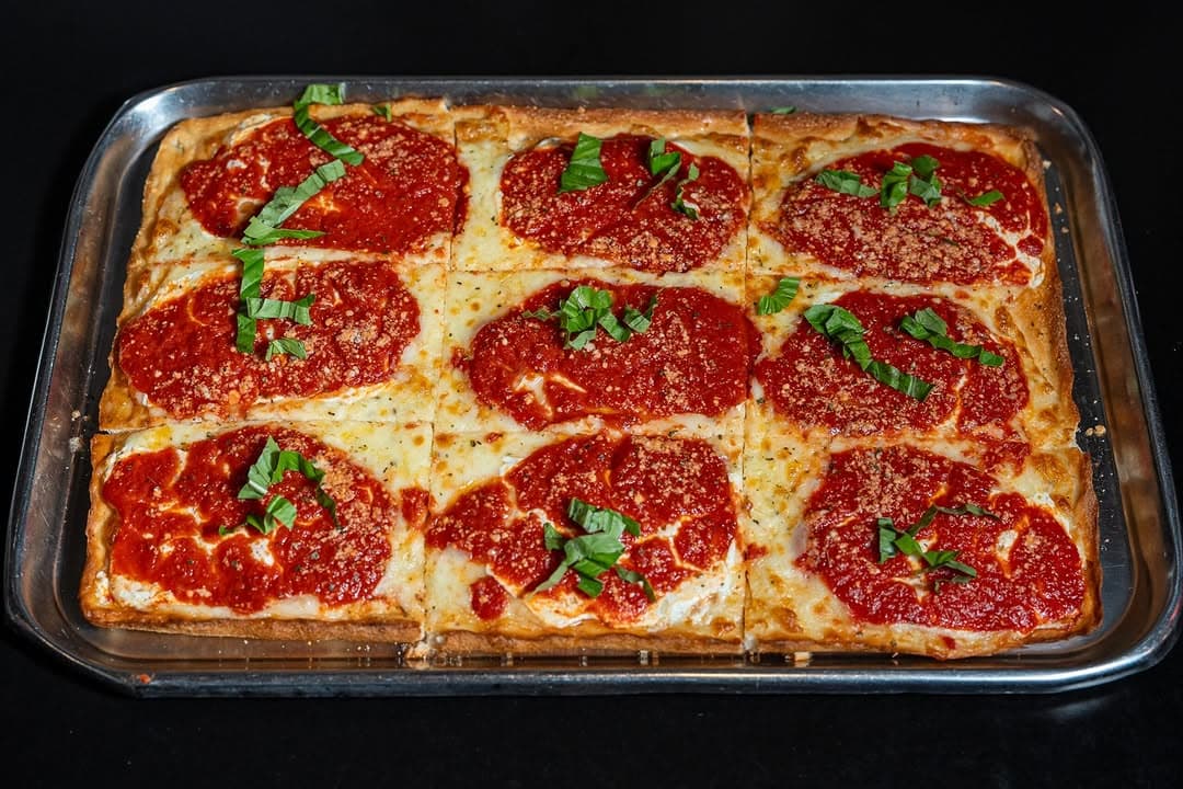Square Grandma pizza with tomato sauce and mozzarella, from a Bravo Pizza Instagram post